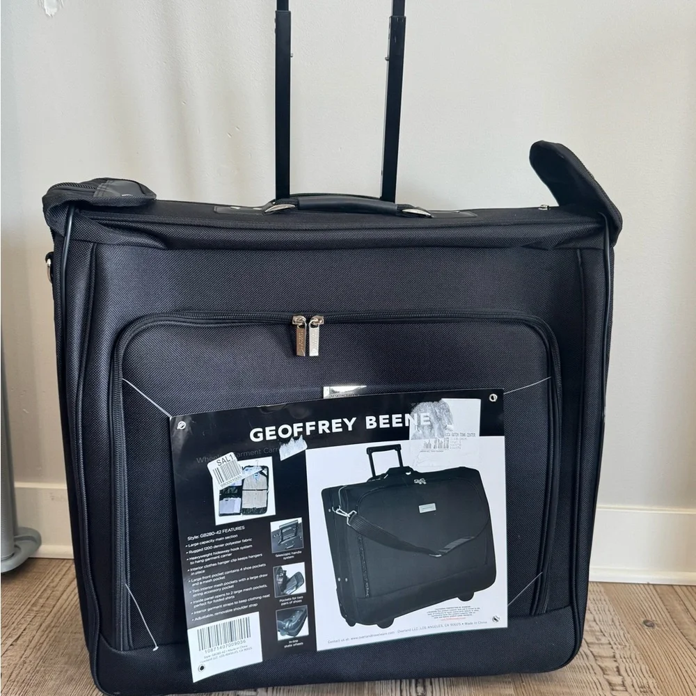 Geoffrey Beene Travel Luggage Bag Rolling Garment Carrier, clothing organizer
